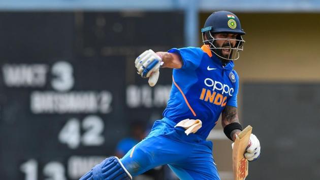 Virat Kohli of India celebrates his century (100 runs) during the 2nd ODI match.(AFP)