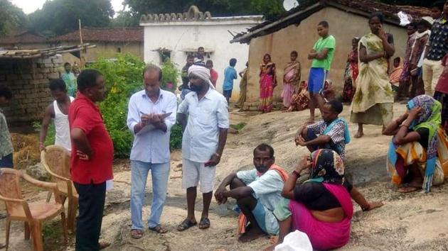 Villagers gathered before the house where wild elephants trampled to death a girl at at Majhkera Pahantoli under Basia police station in Gumla .(HT photo)