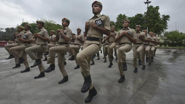 Cadets during a physical drill at the training centre. The training lasts for a period of six months, and equips the cadets to deal with all kinds of situations at the scene of a fire. (Raj K Raj / HT Photo) 