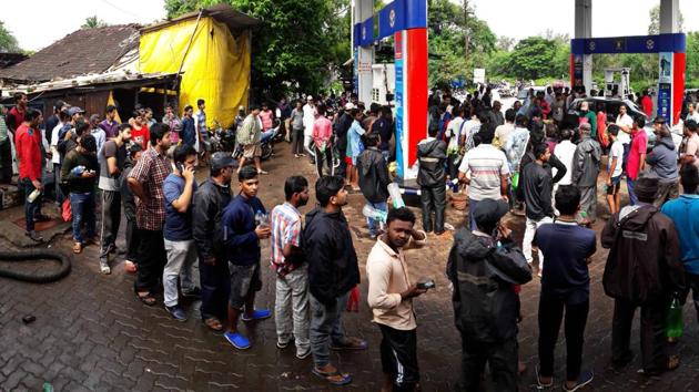 Pople queue up for fuel on petrol pump at Devkar Panand Parisar in Kolhapur on Monday. (Photo: Anil Velhal) Pople queue up for fuel on petrol pump at Devkar Panand Parisar in Kolhapur on Monday. (Photo: Anil Velhal)