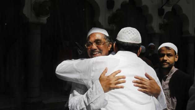 People greet each other after offering prayers during Eid al-Adha inside the Vasi Ullah mosque in Prayagraj, Uttar Pradesh. Eid al-Adha, also known as Bakrid or Id-ul-Zuha, marks Prophet Abraham’s sacrifice of a lamb after God spared his son, Prophet Ismail. (Rajesh Kumar Singh / AP)