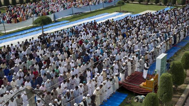 Kashmiri Muslims participate in Eid prayers outside a mosque in Srinagar, Kashmir. (AP photo) Kashmiri Muslims participate in Eid prayers outside a mosque in Srinagar, Kashmir. (AP photo)