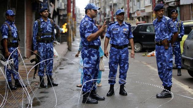 Rapid Action Force personnel stand guard in front of closed shops ahead of Eid-al-Adha prayers in Jammu. In Kashmir, Eid prayers were limited to neighbourhood mosques as authorities imposed strict controls and security forces fanned out across towns and villages, restricting the movement of people and prohibiting congregations in large grounds. This comes exactly a week after the Centre announced that Jammu and Kashmir’s special status under Article 370 was being revoked. (Rakesh Bakshi / AFP)