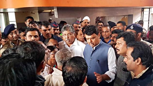 Maharashtra Chief Minister Devendra Fadnavis visited Shivaji Nagar area in Kolhapur to review rescue and relief operations. CM also met flood-affected people staying at Kalyani Hall in Kolhapur on Thursday. (ANI PHOTO) Maharashtra Chief Minister Devendra Fadnavis visited Shivaji Nagar area in Kolhapur to review rescue and relief operations. CM also met flood-affected people staying at Kalyani Hall in Kolhapur on Thursday. (ANI PHOTO)