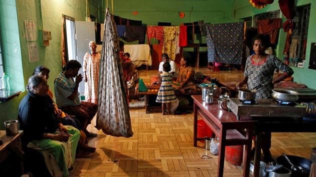 Flood-affected people sit inside a school, which has been converted into a temporary relief camp, in Eloor near Kochi. The state government said proper preparations were helping prevent damage. Over 225,000 people were shifted to 1,550 relief camps, and water levels in major dams were not worrying at the moment, chief minister Pinarayi Vijayan told reporters. “Well- planned efforts have helped reduce casualties,” he said after a review meeting in state capital Thiruvananthapuram. (Sivaram V / REUTERS)