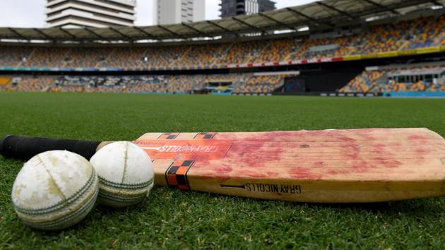 Bat and balls can be seen as players warm-up.(Getty Images)