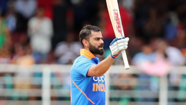 PORT OF SPAIN, TRINIDAD AND TOBAGO - AUGUST 11: Virat Kohli of India celebrates his century during the second ODI between the West Indies and India.(Getty Images)