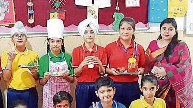 Students with nutritional food items prepared by them for their siblings. Students with nutritional food items prepared by them for their siblings.