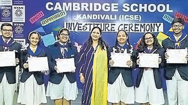 Students of the Cambridge school after the investiture ceremony.