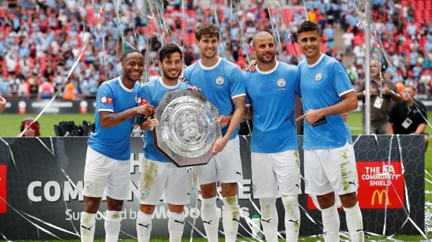 Manchester City's Raheem Sterling, David Silva, John Stones, Kyle Walker and Rodri pose as they celebrate winning the FA Community Shield. (REUTERS) Manchester City's Raheem Sterling, David Silva, John Stones, Kyle Walker and Rodri pose as they celebrate winning the FA Community Shield. (REUTERS)