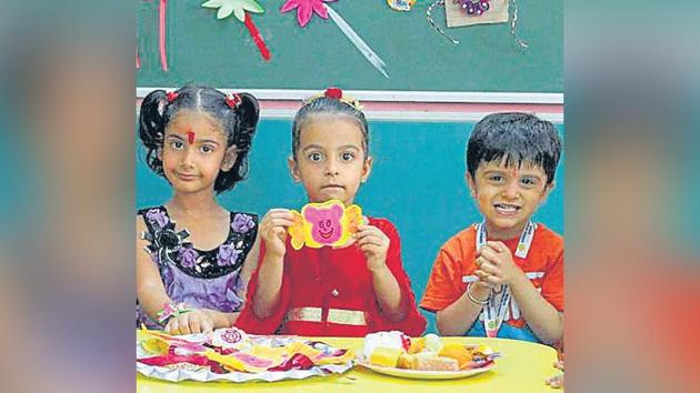 Students during rakhi celebrations. Students during rakhi celebrations.