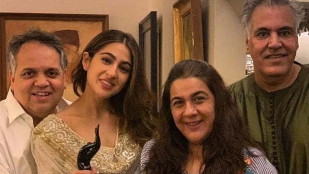 Abu Jani and Sandeep Khosla with Amrita Singh and Sara Ali Khan. Abu Jani and Sandeep Khosla with Amrita Singh and Sara Ali Khan.