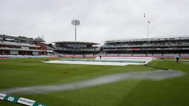 General view of covers on the field as rain delays play.(Action Images via Reuters)