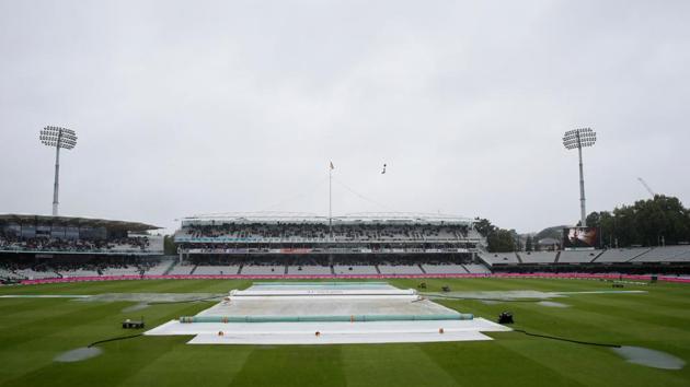 General view of covers on the field as rain delays play.(Action Images via Reuters)