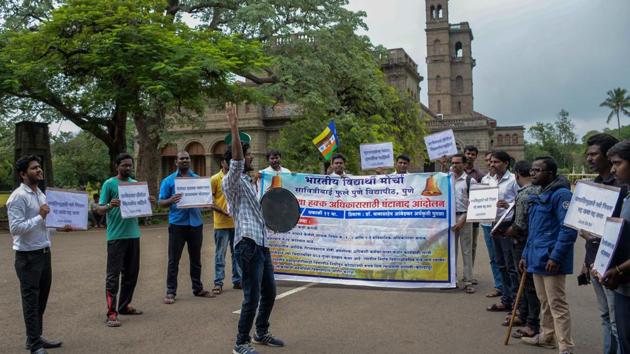Students performed a street play outside Savitribai Phule Pune University’s main building to highlight the issues they were facing on campus, on Tuesday.(Milind Saurkar/HT Photo) Students performed a street play outside Savitribai Phule Pune University’s main building to highlight the issues they were facing on campus, on Tuesday.(Milind Saurkar/HT Photo)
