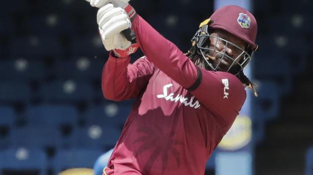 West Indies opening batsman Chris Gayle hits a four.(AP)