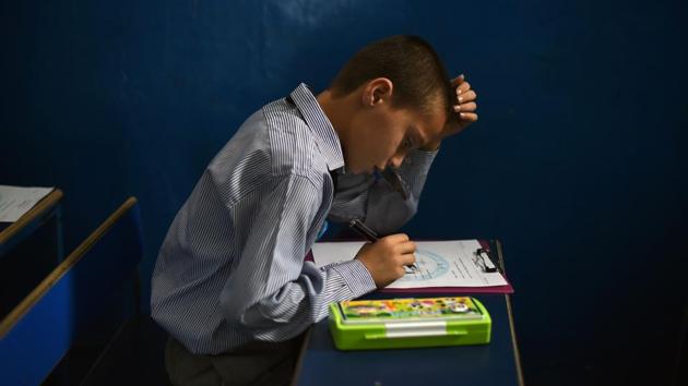 Amir Gul, aged about 15, said he and his classmates are constantly anxious. “We are always afraid a bomb might go off. Everyone is scared and no one can study,” he said. According to the United Nations Children’s Fund (UNICEF), the number of attacks against Afghan schools tripled last year compared to 2017. By the end of 2018, more than 1,000 Afghan schools had been shut due to conflict, denying about 500,000 Afghan kids access to education. (WAKIL KOHSAR / AFP) Amir Gul, aged about 15, said he and his classmates are constantly anxious. “We are always afraid a bomb might go off. Everyone is scared and no one can study,” he said. According to the United Nations Children’s Fund (UNICEF), the number of attacks against Afghan schools tripled last year compared to 2017. By the end of 2018, more than 1,000 Afghan schools had been shut due to conflict, denying about 500,000 Afghan kids access to education. (WAKIL KOHSAR / AFP)