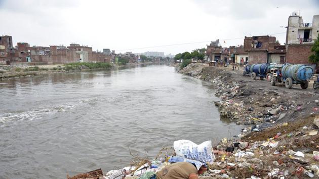 Waste seen near Hindon River at Vijay Nagar, in Ghaziabad, on Thursday, Aug 15, 2019. Not just industrial units, waste and sewage from unauthorised settlements on river bank also flow into the river. (Sakib Ali / HT Photo) Waste seen near Hindon River at Vijay Nagar, in Ghaziabad, on Thursday, Aug 15, 2019. Not just industrial units, waste and sewage from unauthorised settlements on river bank also flow into the river. (Sakib Ali / HT Photo)