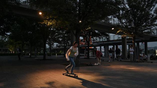 The skateboarders would be happy to practise on the streets or in other public spaces, but sometimes they are fined or chased away by the black-shirted security guards that are omnipresent in Chinese cities. “To clear us out of here, security guards even sprayed water on the ground before. From Monday to Friday, they will not care too much about you, but on weekends they are strict and drive us away,” said Chen, a university student. (HECTOR RETAMAL / AFP)