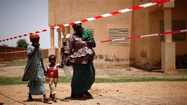 Local women and children arrive at an abandoned clinic to receive medical care in Ndaki, Mali. While Serval had brought moderate stability to northern Mali, unrest had spread to the country’s more populated centre, with attacks also reaching neighbouring Burkina Faso, Niger and even Ivory Coast. With no end date announced at its launch, the follow-up operation would try to stabilise countries in the region by assisting their governments in a West African anti-terrorism force. Five years on, no end is in sight. (Benoit Tessier / REUTERS)