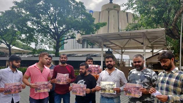 Residents staying around the recently collapsed Ulhasnagar building in Kalyan protested outside the Maharashtra assembly in Mumbai, on Thursday, August 15, 2019. (HT Photo) Residents staying around the recently collapsed Ulhasnagar building in Kalyan protested outside the Maharashtra assembly in Mumbai, on Thursday, August 15, 2019. (HT Photo)