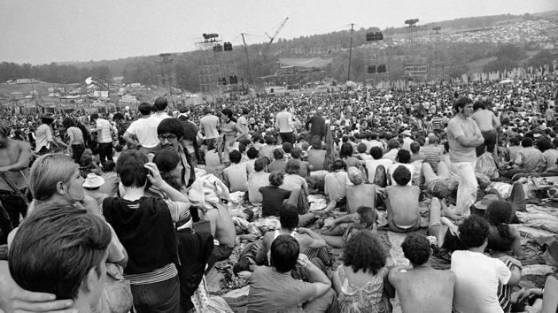 FILE - This Aug. 14, 1969 file photo shows a portion of the 400,000 concert goers who attended the Woodstock Music and Arts Festival held on a 600-acre pasture near Bethel, N.Y. For the first time, an audio recording is available of nearly everything heard onstage at Woodstock 50 years ago - A 38-disc package "Woodstock - Back to the Garden - The Definitive Anniversary Archive" is available now. (AP Photo/File)(AP)