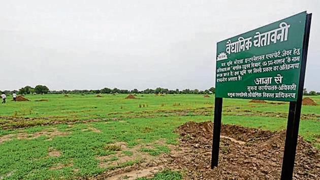 On August 6 this year, the two agencies took possession of land from Ranhera village, the first village from which land was taken over, and Kishorpur will be the third. (HT image) On August 6 this year, the two agencies took possession of land from Ranhera village, the first village from which land was taken over, and Kishorpur will be the third. (HT image)