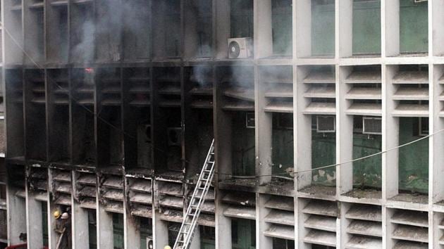 A senior police officer present on the spot said the fire was limited to three-four rooms on the fifth floor.(ANI Photo)