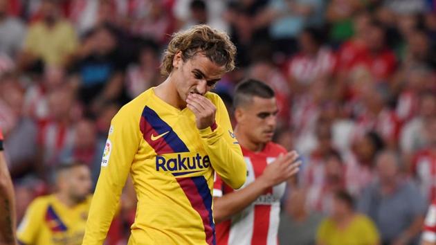 Barcelona's Antoine Griezmann looks dejected.(REUTERS)