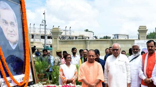 Uttar Pradesh Chief Minister Yogi Adityanath Pays tribute to Former Prime Minister Atal Bihari Vajpayee on his first death Anniversary at Lok Bhavan Sectretriate in Lucknow on Friday. (ANI Photo)