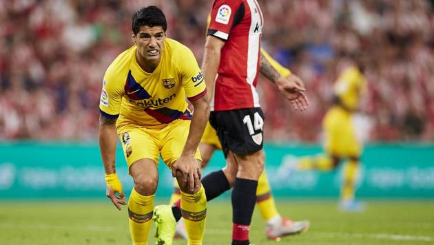 Luis Suarez reacts during the Spanish La Liga soccer match between Athletic Bilbao and FC Barcelona at San Mames Stadium. (AP) Luis Suarez reacts during the Spanish La Liga soccer match between Athletic Bilbao and FC Barcelona at San Mames Stadium. (AP)