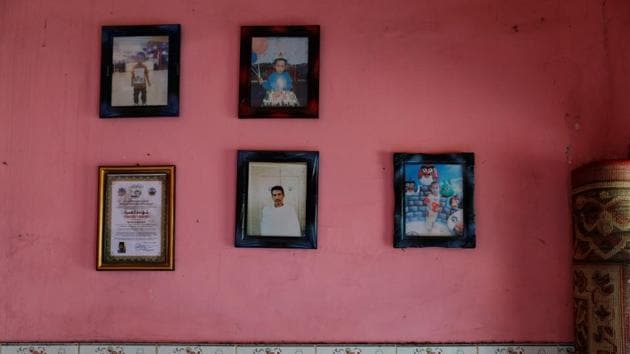 Portraits of Salam, 54, and his grandson Rayhan Fastabichul Khoirot are displayed inside Salam’s house. Salam said recycled rubbish paid for his children’s schooling, and also bought a house for his family and livestock. “I have nine goats now,” said Salam, who works as a waste broker between villagers and a nearby paper factory and says his job is easier than farming. (Willy Kurniawan / REUTERS) Portraits of Salam, 54, and his grandson Rayhan Fastabichul Khoirot are displayed inside Salam’s house. Salam said recycled rubbish paid for his children’s schooling, and also bought a house for his family and livestock. “I have nine goats now,” said Salam, who works as a waste broker between villagers and a nearby paper factory and says his job is easier than farming. (Willy Kurniawan / REUTERS)