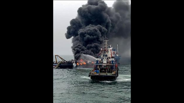 Rescue operations underway to douse the fire that broke on the Offshore Support Vessel Coastal Jaguar near Visakhapatnam port, Andhra Pradesh. - 28 of the 29 crew members of the ship that caught fire were rescued after jumping into the waters, local reports said. (Indian Coast Guard / AFP) Rescue operations underway to douse the fire that broke on the Offshore Support Vessel Coastal Jaguar near Visakhapatnam port, Andhra Pradesh. - 28 of the 29 crew members of the ship that caught fire were rescued after jumping into the waters, local reports said. (Indian Coast Guard / AFP)