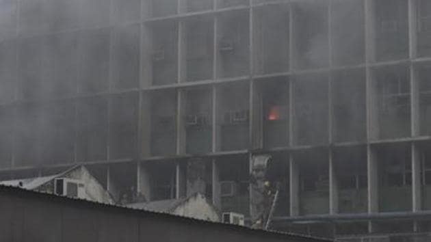 Firefighters at the site of a major fire that broke out in the 2nd floor of the PC block near the emergency ward at All India Institute of Medical Sciences (AIIMS). (Sanjeev Verma/HT PHOTO) Firefighters at the site of a major fire that broke out in the 2nd floor of the PC block near the emergency ward at All India Institute of Medical Sciences (AIIMS). (Sanjeev Verma/HT PHOTO)