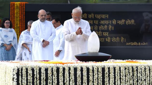 Prime Minister Narendra Modi pays tribute to former prime minister Atal Bihari Vajpayee on his first death anniversary, in the presence of Home Minister Amit Shah, at his memorial, Sadaiv Atal, in New Delhi. (Arvind Yadav / HT Photo) Prime Minister Narendra Modi pays tribute to former prime minister Atal Bihari Vajpayee on his first death anniversary, in the presence of Home Minister Amit Shah, at his memorial, Sadaiv Atal, in New Delhi. (Arvind Yadav / HT Photo)