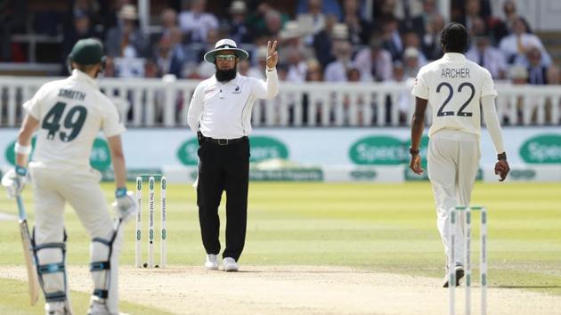 Umpire Aleem Dar warns England's bowler Jofra Archer that he has bowled two delivers above head height during play(AP)