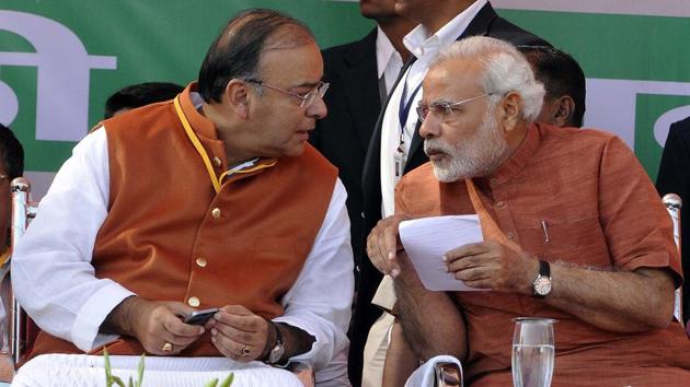 Jaitley in conversation with BJP’s Prime Ministerial candidate Narendra Modi during a campaign rally ahead of the 2013 Delhi Assembly elections. The BJP failed to clinch a majority in the Delhi Assembly that year, but won the general elections the following year in 2014, with Modi fulfilling his long-standing dream to lead the government. Jaitley was among the first to realise the potential of Modi, and the two stayed together through thick and thin. (Sonu Mehta / HT Archive)