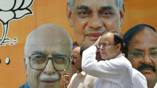 With the NDA’s defeat in the general elections of 2004, Jaitley returned to serving as a general secretary and spokesperson of the BJP. Party president M. Venkaiah Naidu appointed Jaitley and Rajnath Singh as the party’s general secretaries. In the backdrop, a party poster depicts former deputy Prime Minister LK Advani, former Prime Minister Atal Bihari Vajpayee and M. Venkaiah Naidu. (Gurinder Osan / AP File)