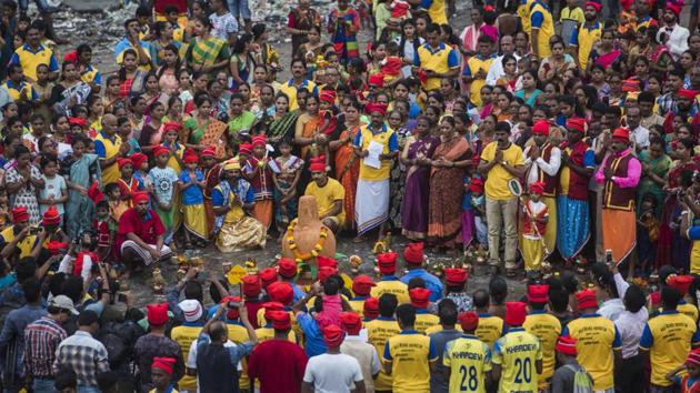 People from the Koli community perform rituals on the occasion of Narali Purnima at Badhwar Park, Cuff Parade, in Mumbai, Maharashtra. (Pratik Chorge / HT Photo) People from the Koli community perform rituals on the occasion of Narali Purnima at Badhwar Park, Cuff Parade, in Mumbai, Maharashtra. (Pratik Chorge / HT Photo)