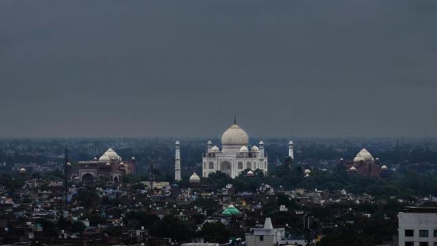 A view of the historic Taj Mahal as dark clouds are seen in the sky, in Agra, Uttar Pradesh. (PTI) A view of the historic Taj Mahal as dark clouds are seen in the sky, in Agra, Uttar Pradesh. (PTI)