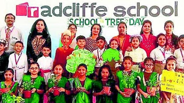 Students celebrates National Tree Day.