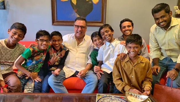 Boman Irani with the boys from Shelter Don Bosco. Boman Irani with the boys from Shelter Don Bosco.