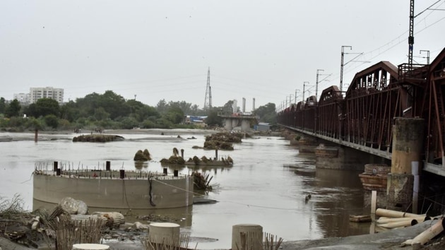Strong water flow in the river helps rid it of pollutants, albeit temporarily.(HT image)