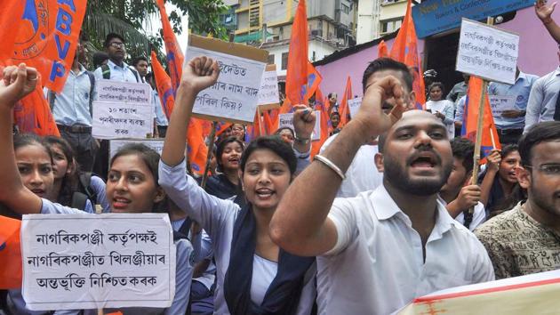 Activists stage a dharna demanding an error-free NRC list. (PTI Photo) Activists stage a dharna demanding an error-free NRC list. (PTI Photo)