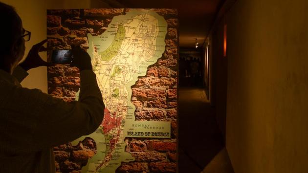 A visitor click pictures of a map inside the Bunker Museum at Raj Bhavan. According to officials, the bunker was created in the 19th century to fire cannons at approaching enemy ships and another section depicts the history of Raj Bhavan (Kunal Patil / HT Photo)