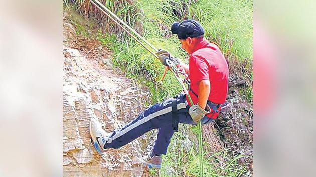 Students during rappelling activity. Students during rappelling activity.