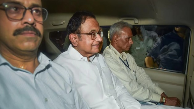 At around 9.45pm, Chidambaram was hustled out of his house, bundled into a car – he sat in the middle on the rear seat of an Innova, between two CBI officials -- and driven away. (PTI photo)