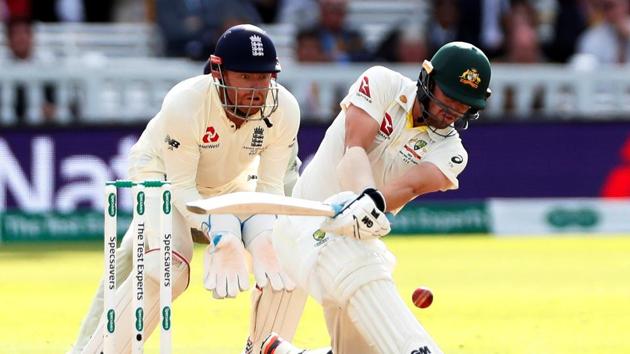 Australia's Travis Head in action as England's Jonny Bairstow reacts Action Images via Reuters/Peter Cziborra(Action Images via Reuters)