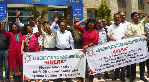 ILD Greens project has presently 550 buyers, a majority of whom are living on rent and also paying EMIs of loan, said the buyers gathered at the Hrera office. (Yogendra Kumar/HT Photo) ILD Greens project has presently 550 buyers, a majority of whom are living on rent and also paying EMIs of loan, said the buyers gathered at the Hrera office. (Yogendra Kumar/HT Photo)