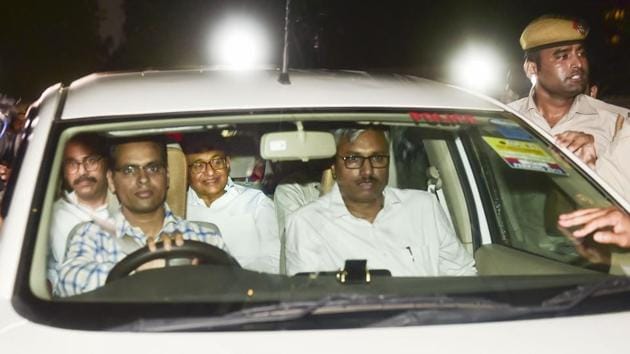 Central Bureau of Investigation (CBI) officials arrest Congress leader P Chidambaram from his Jor Bagh residence in New Delhi, Wednesday, Aug 21, 2019.(Photo: PTI)